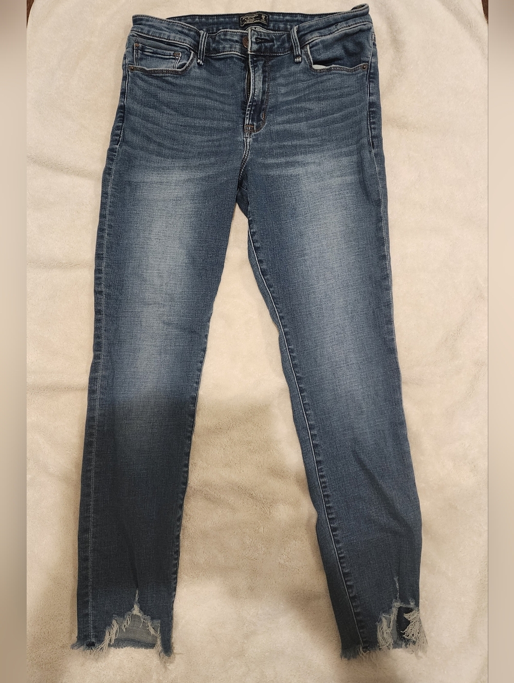 Abercrombie & Fitch Faded Blue Ankle Skinny Jeans with Distressed Hem